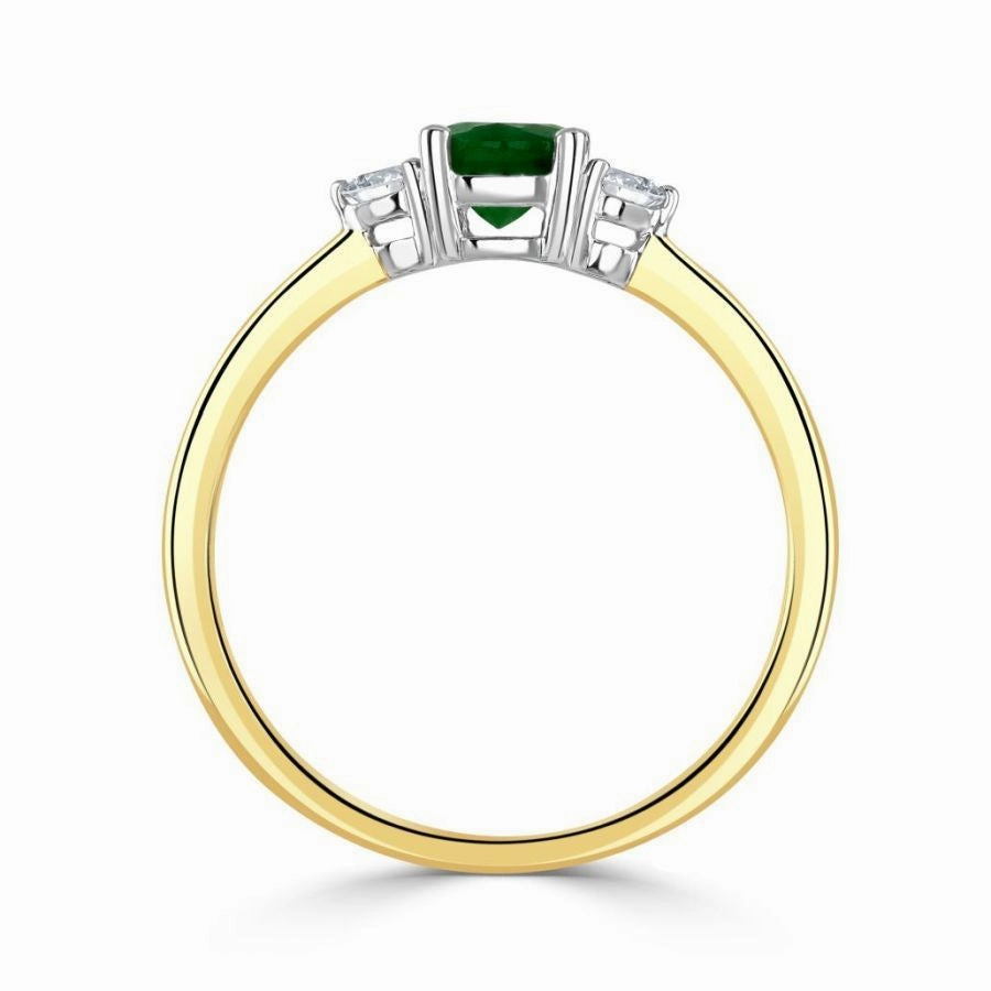 18ct white gold emerald and diamond claw set three stone ring