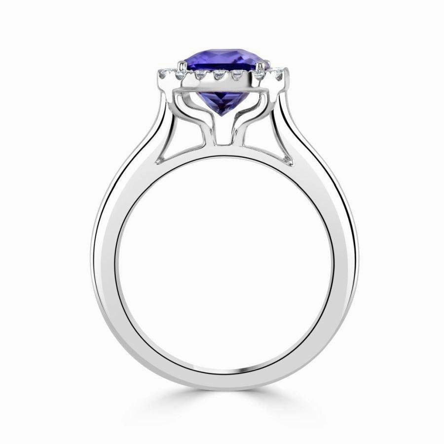 18ct White Gold Octagonal Cut Tanzanite & Diamond Halo Cluster Ring