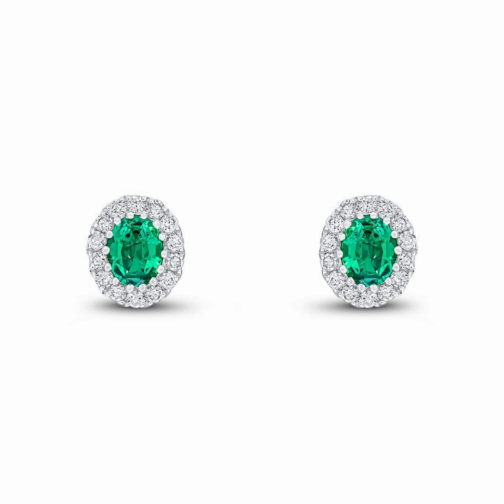 18ct white gold oval emerald and brilliant cut claw set stud earrings