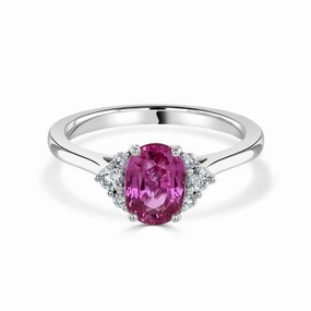 18ct white gold oval pink sapphire and diamond trefoil sides ring all claw set