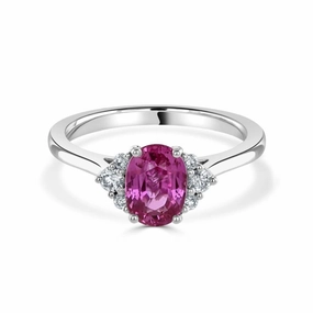 18ct white gold oval pink sapphire and diamond trefoil sides ring all claw set