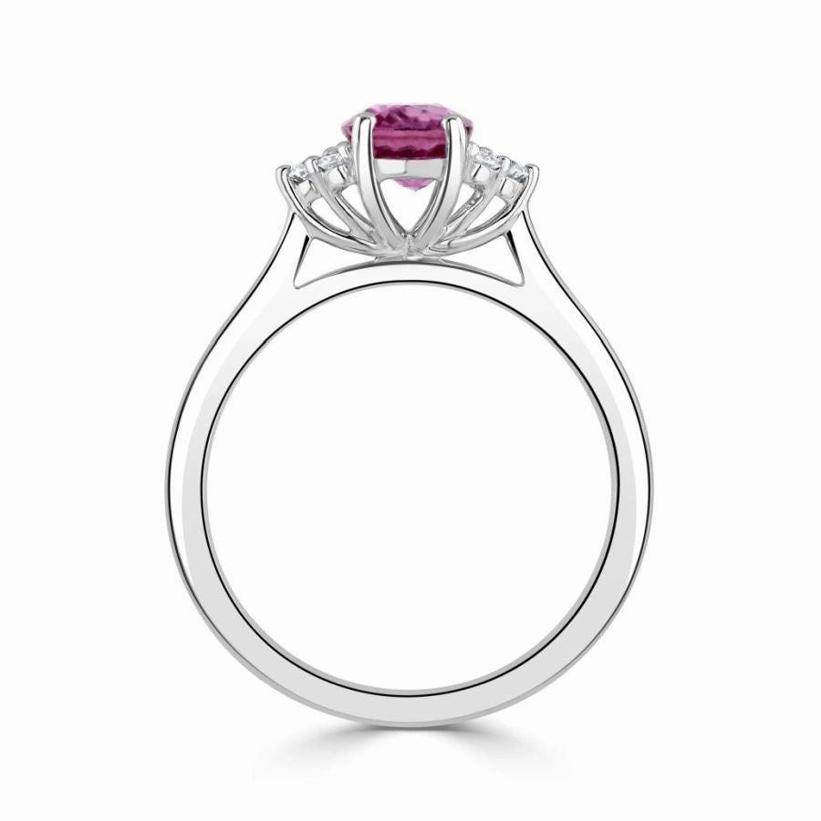 18ct white gold oval pink sapphire and diamond trefoil sides ring all claw set