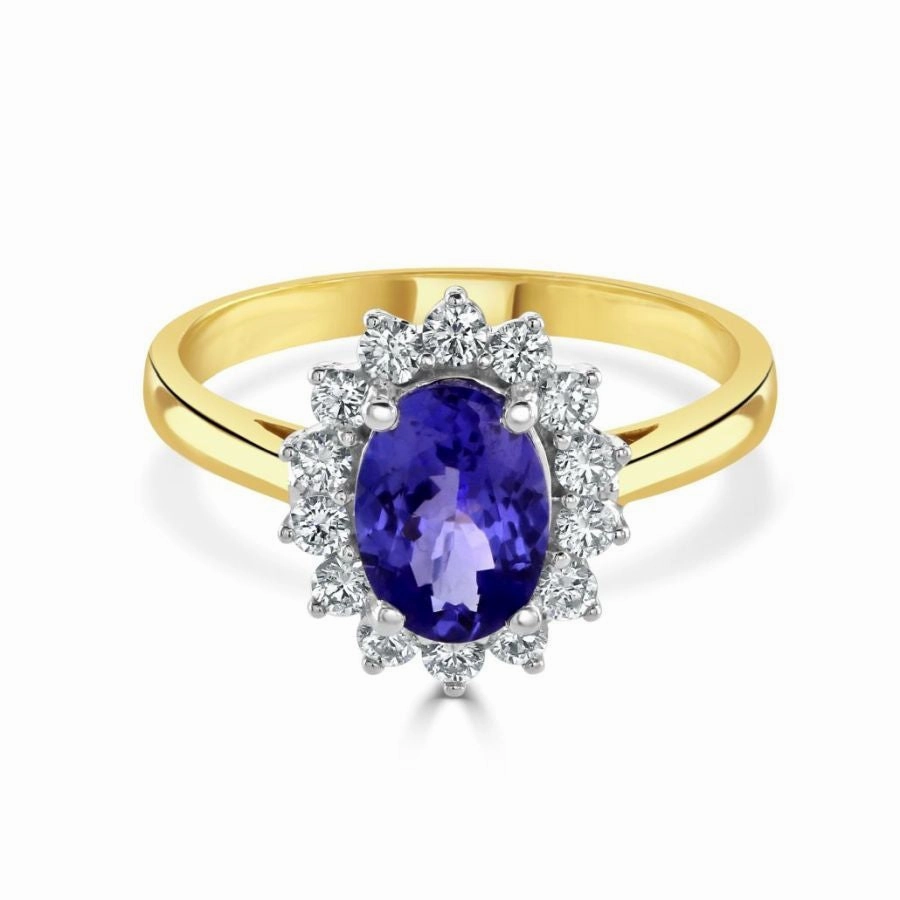 18ct white gold oval tanzanite and diamond claw set ring