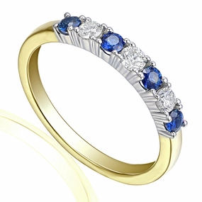 18ct Yellow And White Gold 0.68ct Blue Sapphire And 0.40ct Diamond Seven Stone Ring
