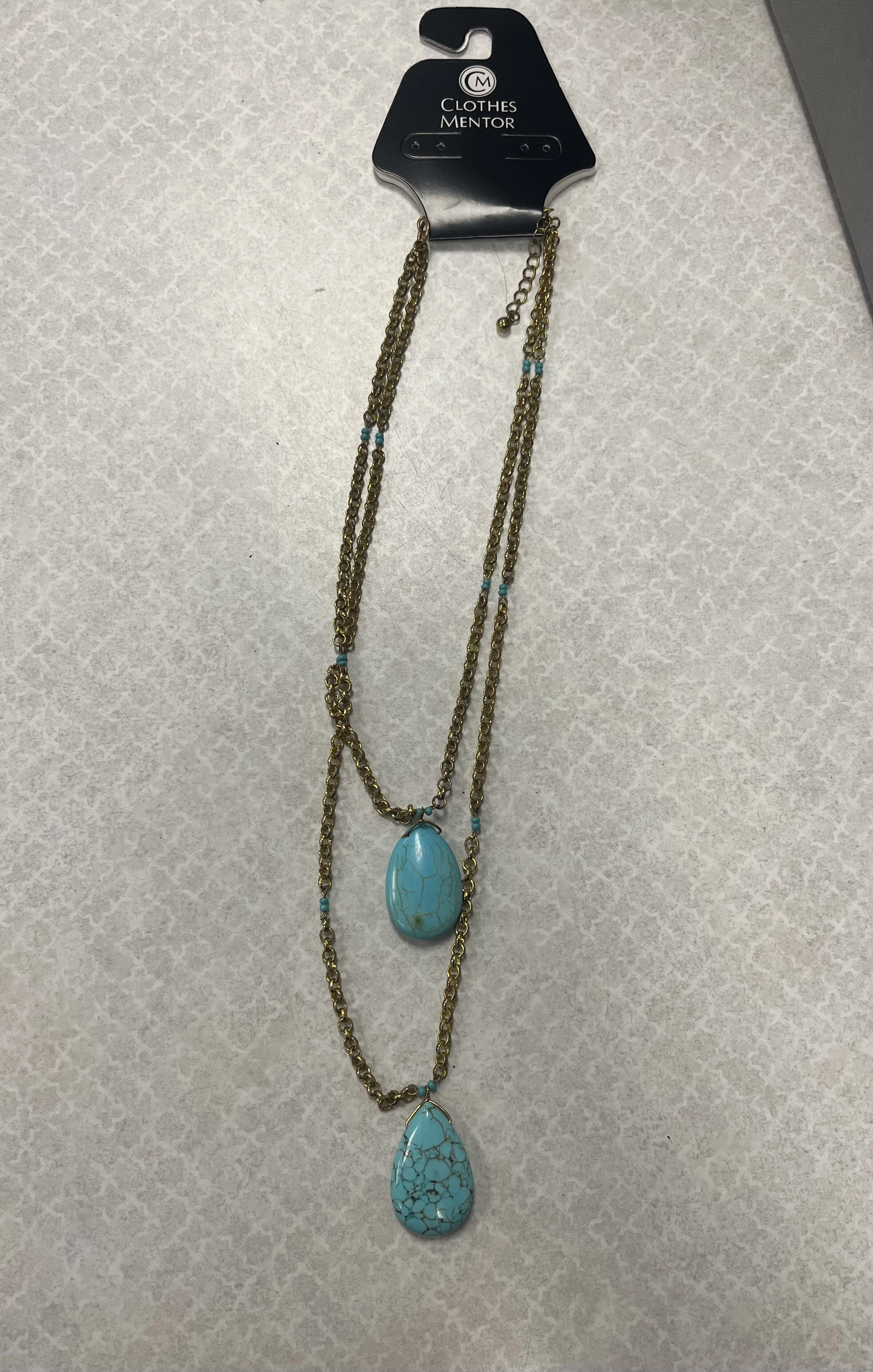 Necklace Layered By Clothes Mentor