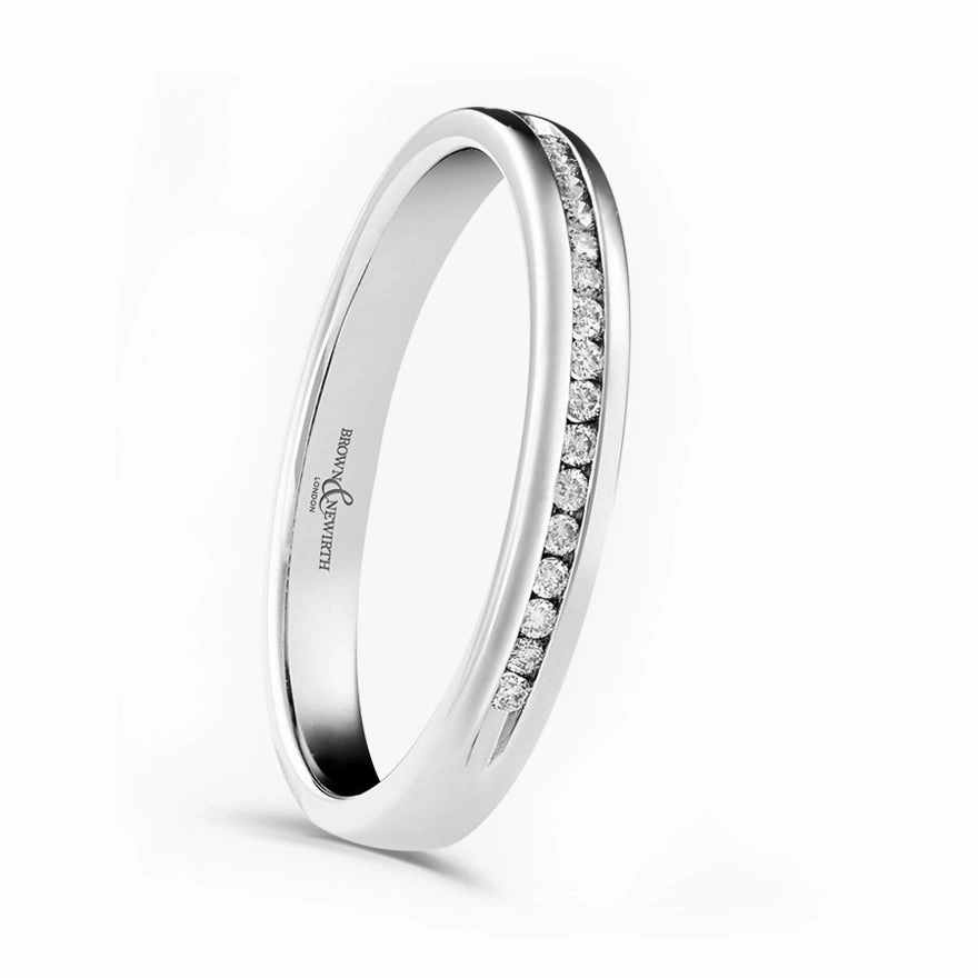 Platinum 0.07ct Round Brilliant Cut Diamond Channel Set Half Eternity Ring