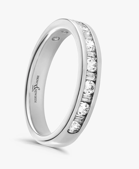 Platinum 0.20ct Round Brilliant And Baguette Cut Diamond Channel Set Half Eternity Ring